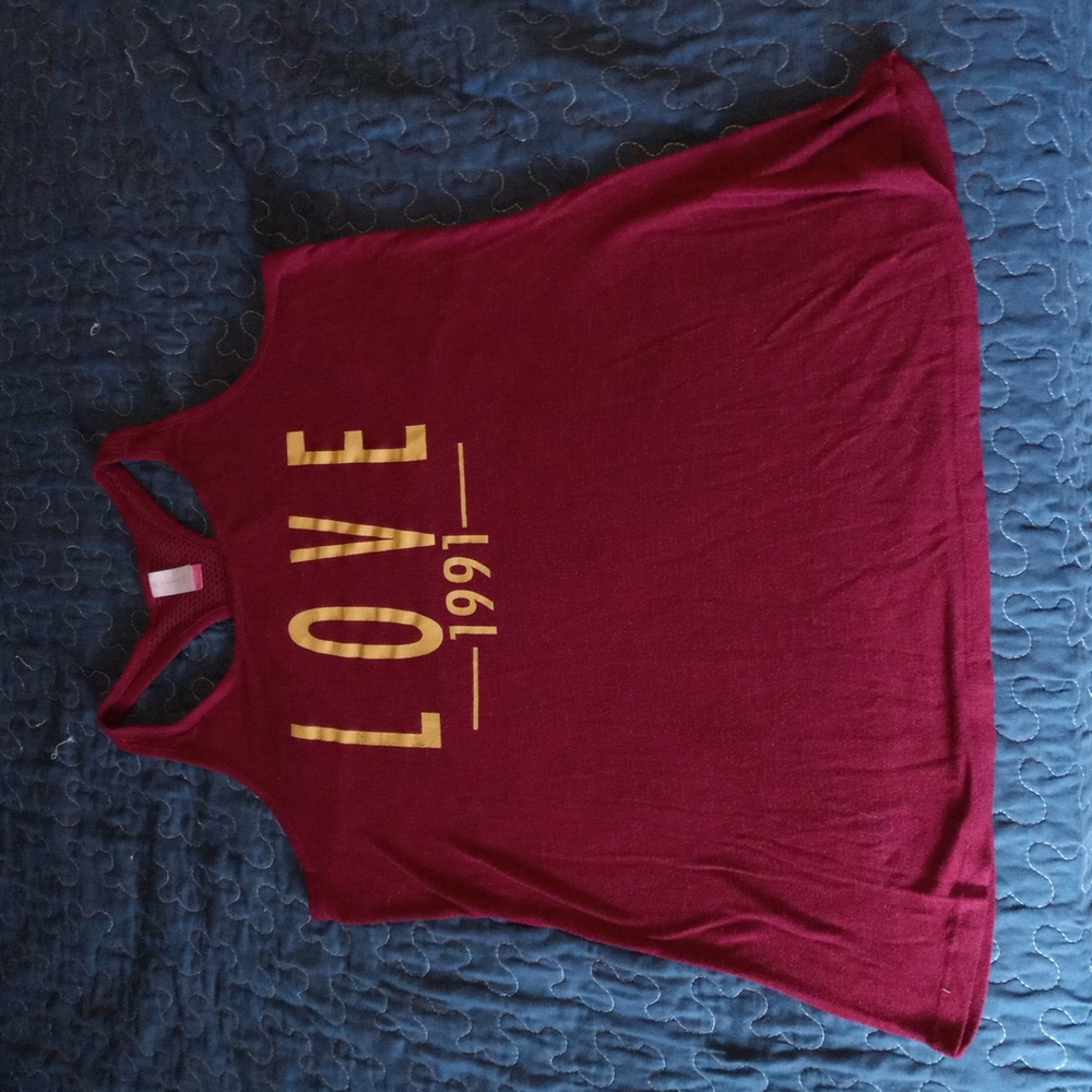 No Boundaries tank top size 15 to 17 love 1991 on the front netting in the back